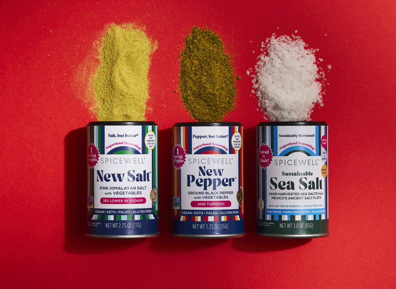 Three Mini Shakers with salt and spice powders on red